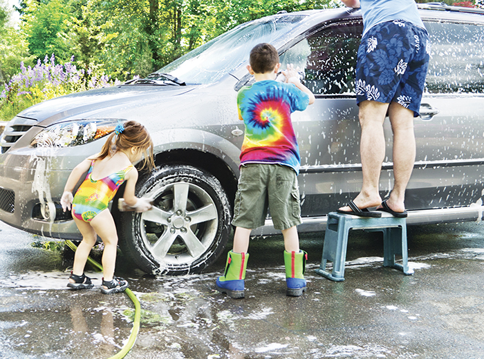 Family washing car