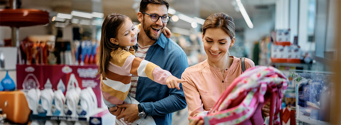 Parents with child in store